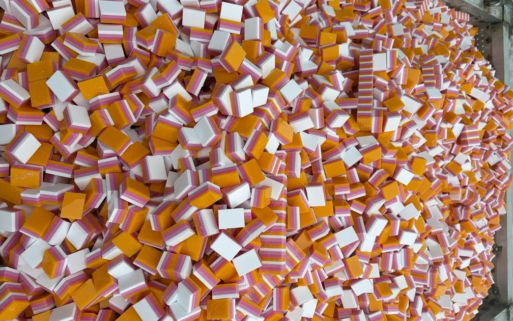 Orange and pink layered acrylic Mahjong blanks in production