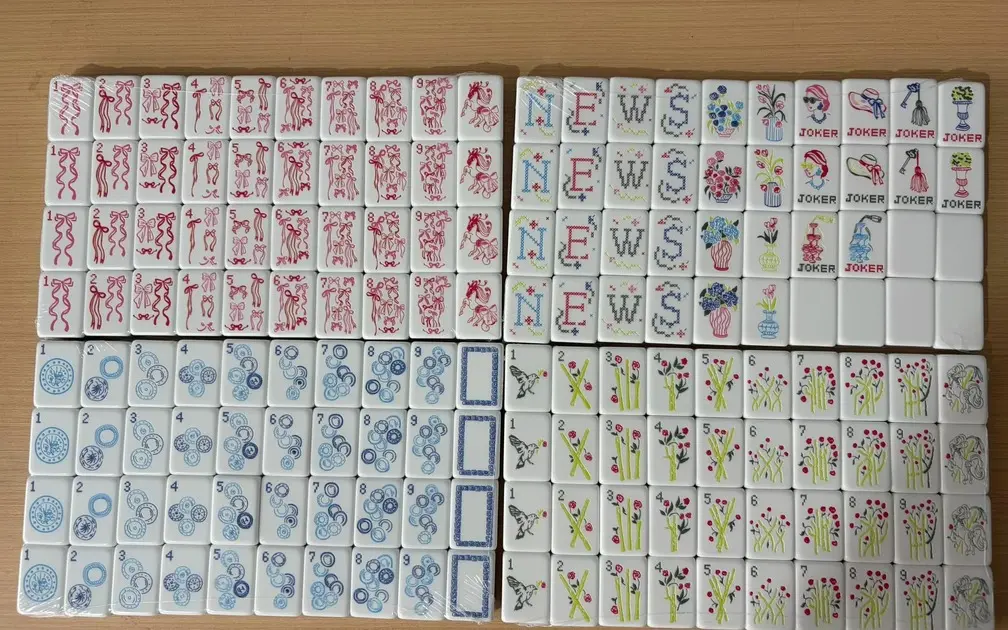 American Mahjong set with blue and red tile artwork