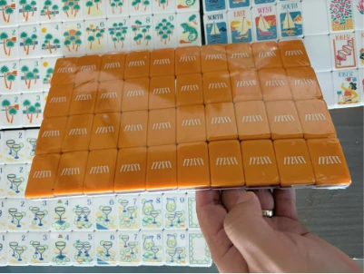 Orange Mahjong tile backs in protective wrapping