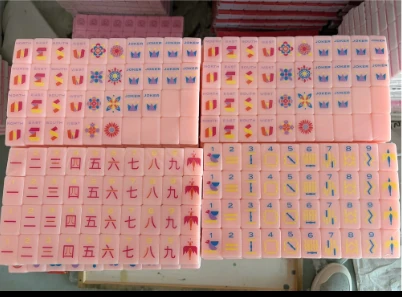 Pink Mahjong tile set with illustrated faces